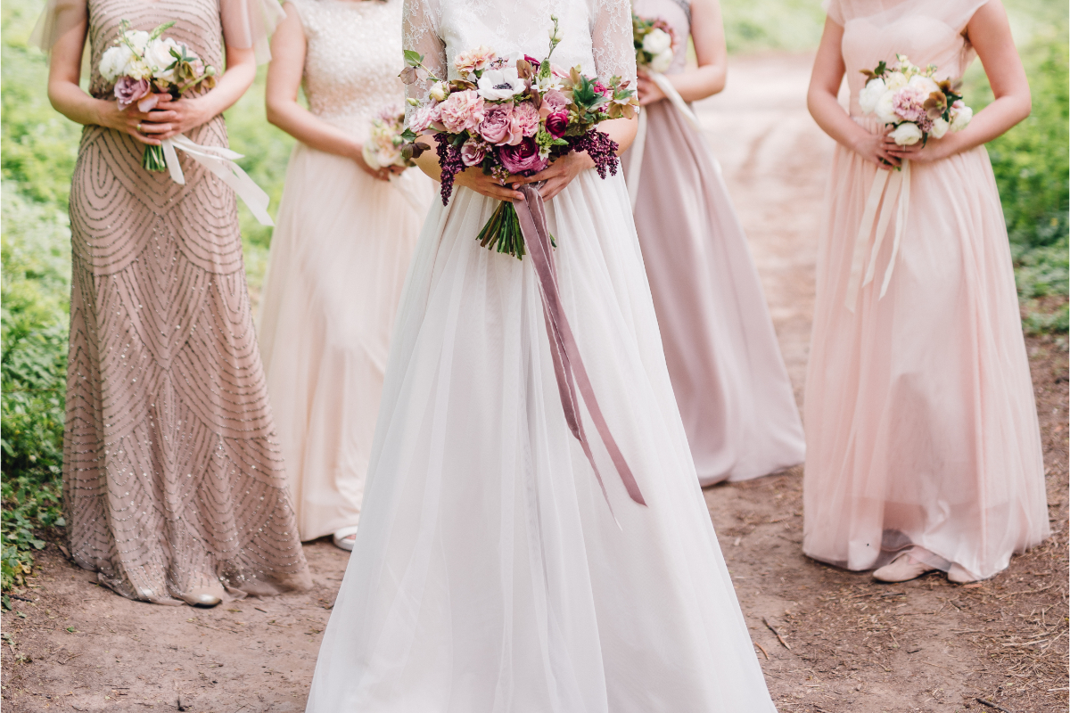Weddo Agency - What Does a Bridesmaid Do - Bridesmaids with buckets 