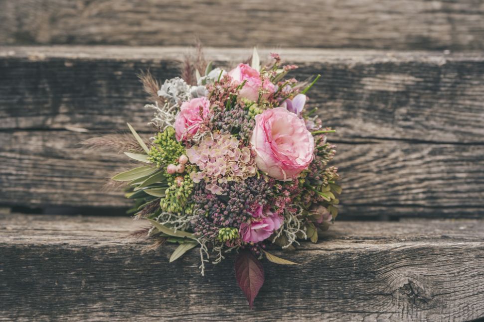 Victorian-wedding-brides-bouquet-with-pink-and-purple-flowers